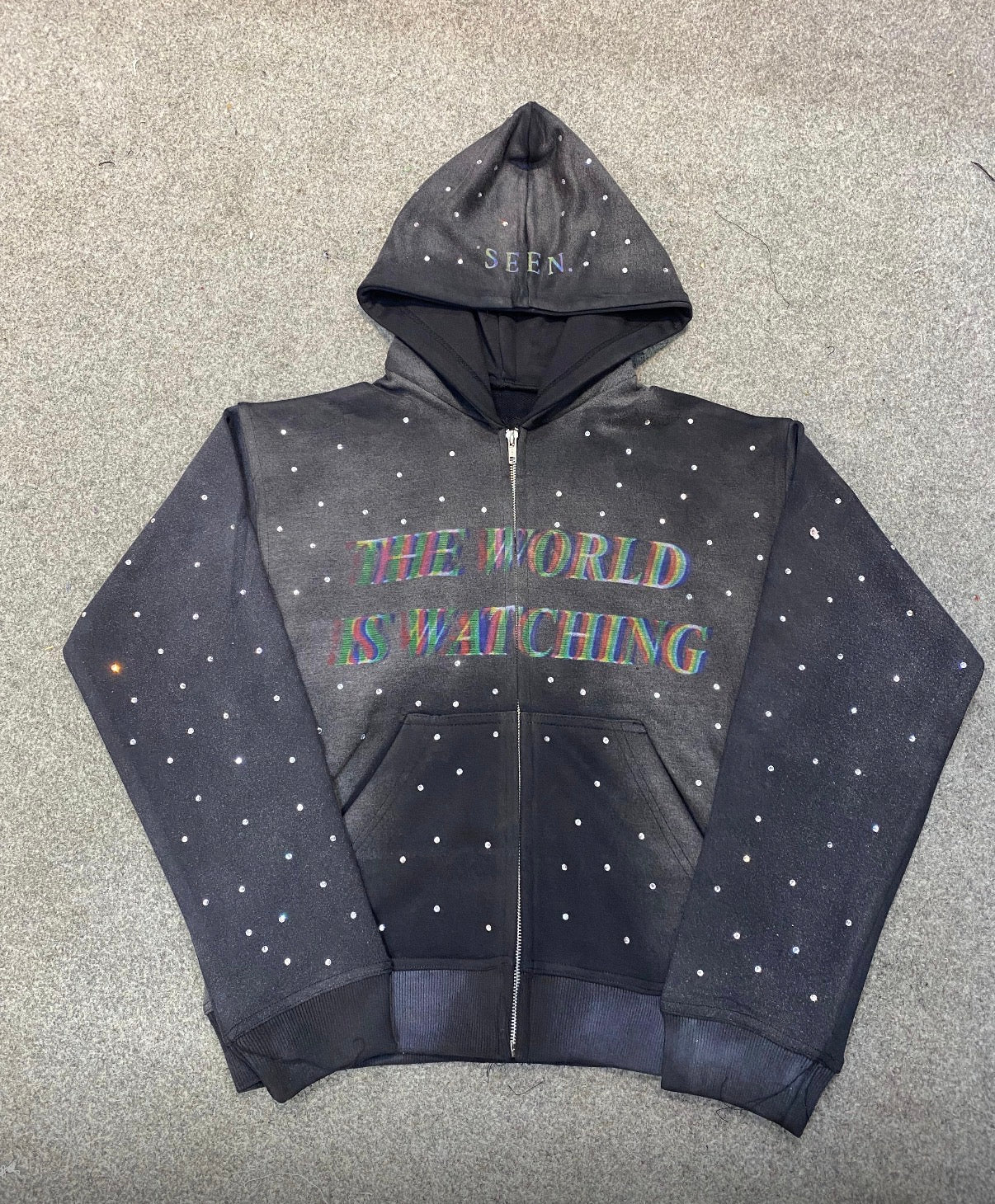 Driplin3.co “THE WORLD IS WATCHING” hoodie (PREORDER)